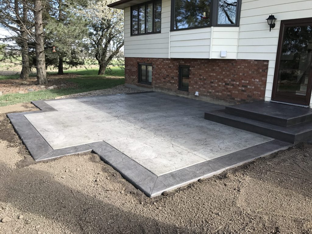 Concrete patio steps with a contrasting trowelled border