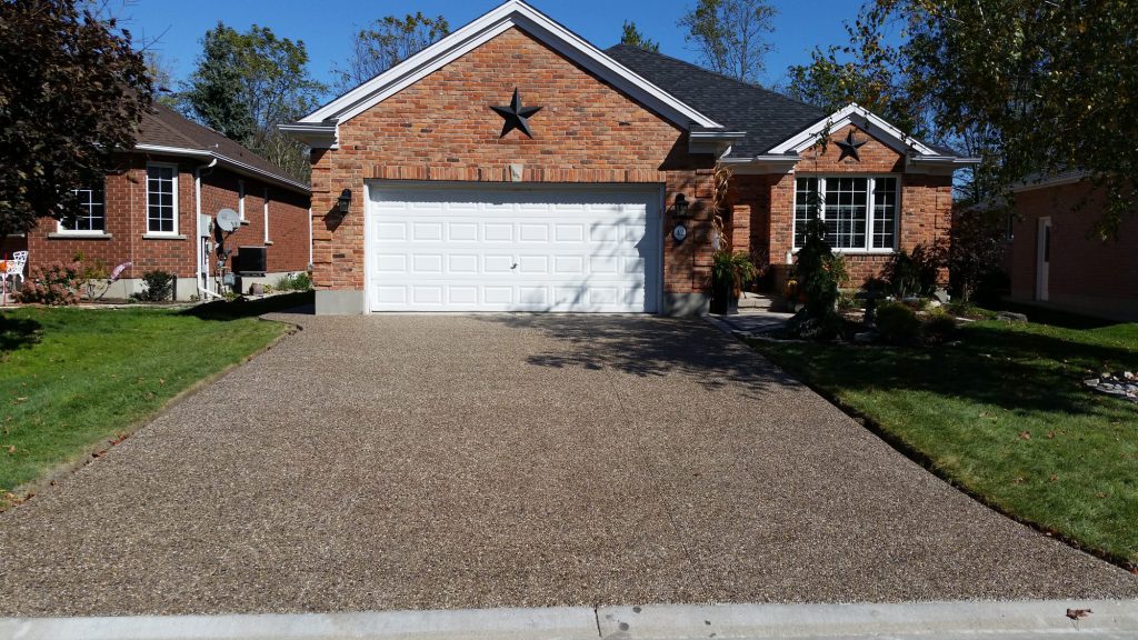 Exposed aggregate concrete driveway on a rural Ontario property