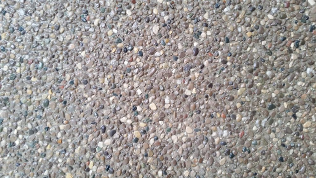 Close-up of exposed aggregate concrete texture