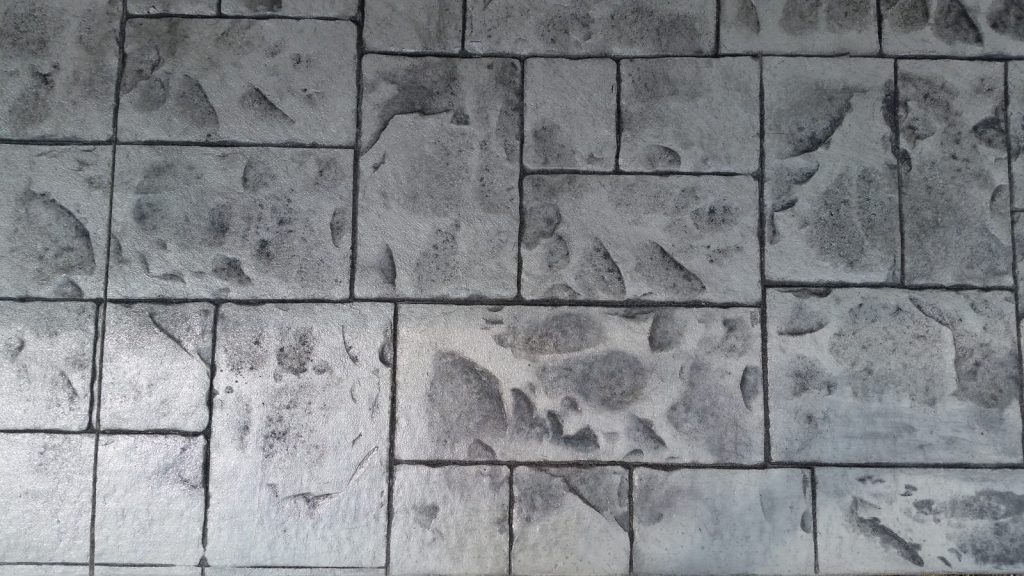 Close-up of stamped concrete slate pattern and colour